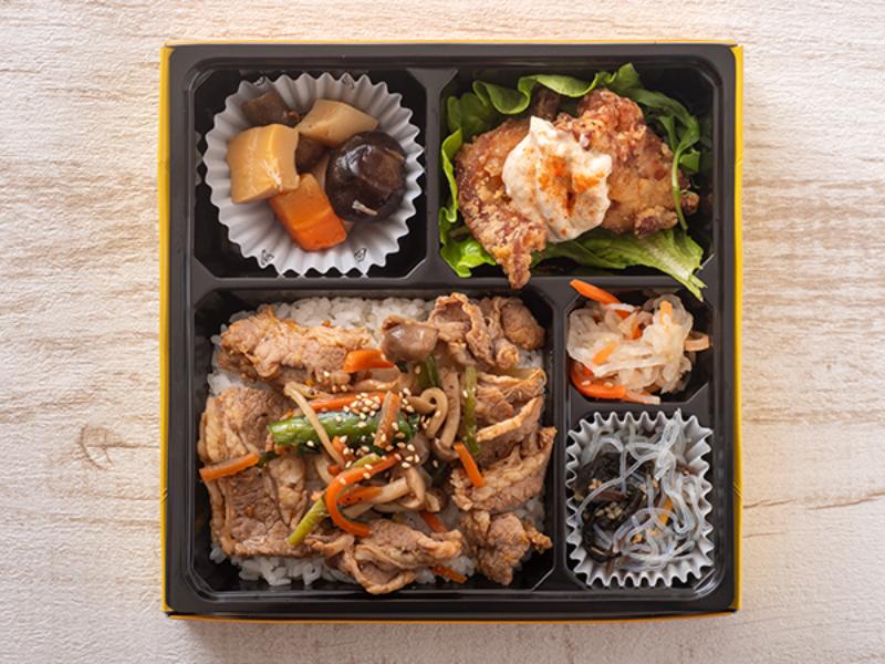 赤いチキン南蛮と焼肉のせ弁当